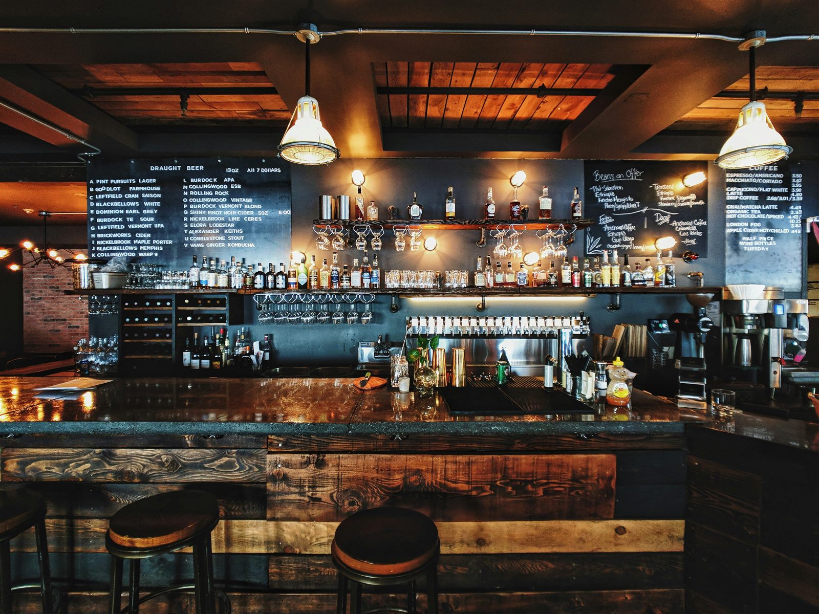 The warm wood-and-brick interior of a neighborhood coffee house
